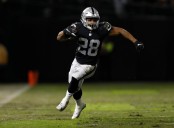 Ex-NFL running back Doug Martin dies in Oakland police custody, sources say