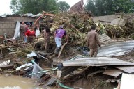 Sube a 78 número de muertes por lluvias