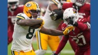 Josh Jacobs runs for 2 TDs, Micah Parsons has 3 sacks as Packers rally past Cardinals 27