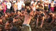 Indian village celebrates end of Diwali with cow dung fight