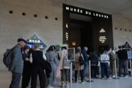 The Louvre reopens three days after thieves took French crown jewels in a daylight heist at the Paris museum