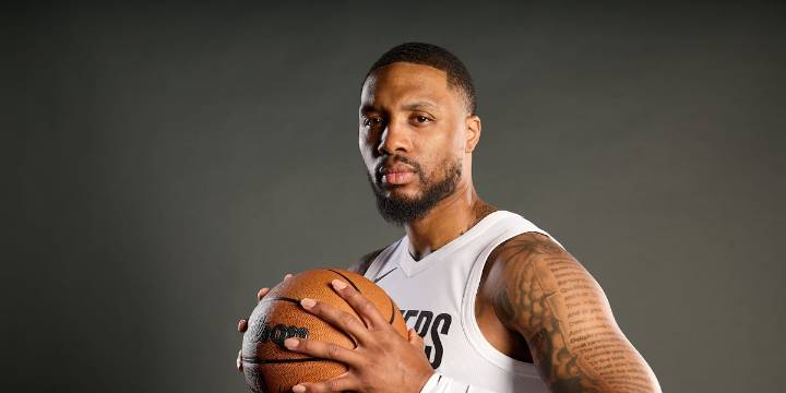 Not currently playing and not a coach, Damian Lillard has a unique role with the Blazers
