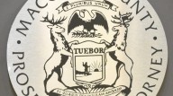 Warren police officer accused of embezzling funds from charity