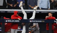 Ryan McMahon flips into Red Sox dugout in huge Yankees win