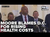 Moore blames DC for rising health costs as critics point to Maryland’s tax burden