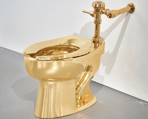 A solid gold toilet is up for auction with a $10 million starting price
