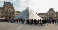 Louvre reopens after jewel heist as police search for thieves