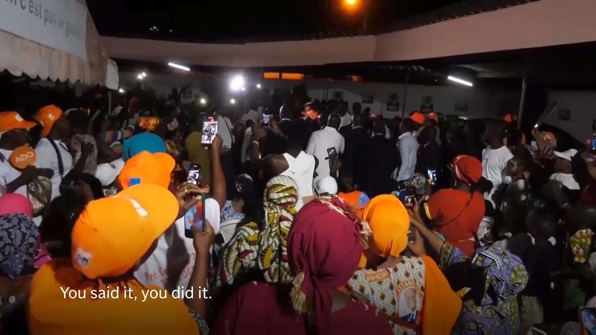 Ivory Coast President Alassane Ouattara's supporters celebrate his reelection