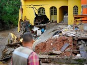 At least 64 dead, 65 missing as floods devastate Mexico