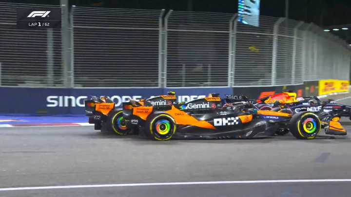 Norris clips Piastri in first lap