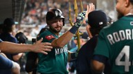 Mariners star Cal Raleigh has epic postgame moment with ‘dump 61 here’ fan