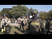 ICE Officers Clash With Protesters in Illinois