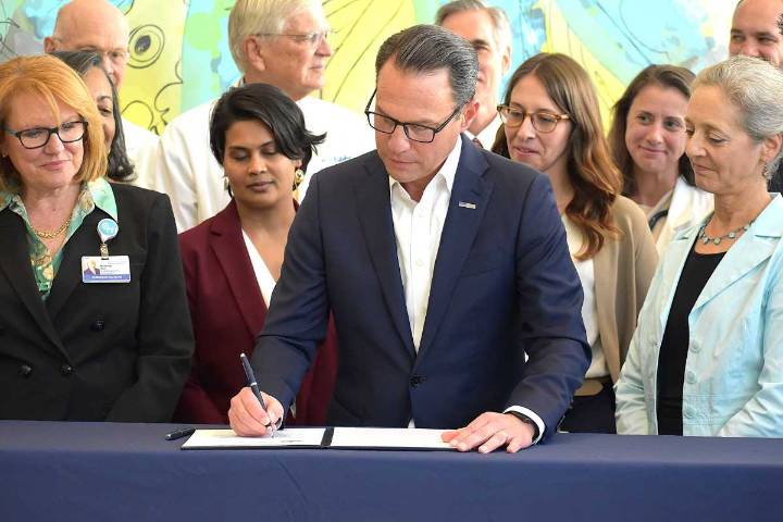 Amid Trump-era changes, Shapiro signs vaccine order at CHOP