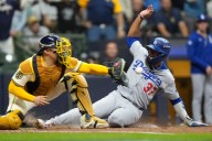 Brewers turn potential grand slam by Dodgers slugger Max Muncy into wild double play in NLCS