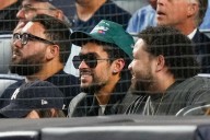 Bad Bunny ripped by MAGA for his actions during ‘God Bless America’ at Yankees game