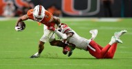 The Latest: Big waves are coming for the top 10 of the AP Top 25