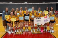 Hudsonville volleyball captain hits milestone, but maintains team