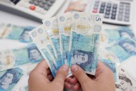 Sterling dips after softer