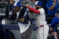 Joe Carter wears Blue Jays’ home run jacket after throwing first pitch at World Series Game 2