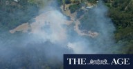 Slow-moving fire threatening properties in Brisbane's north