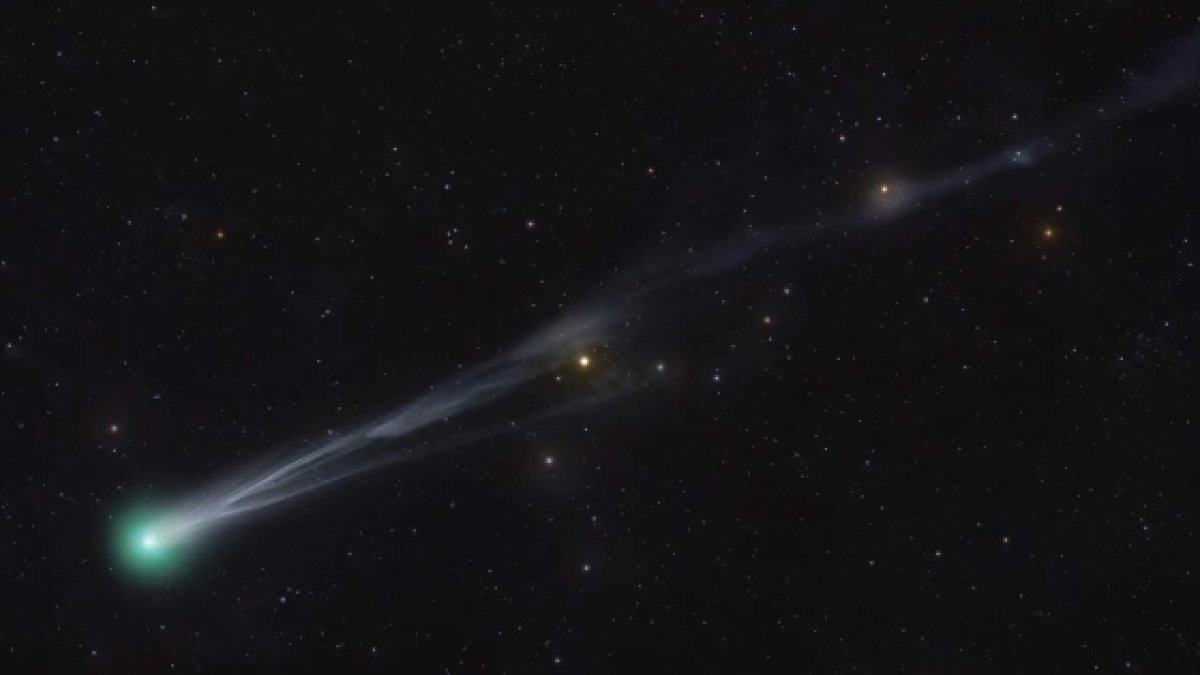 Two greenish comets are streaking across the night sky this month