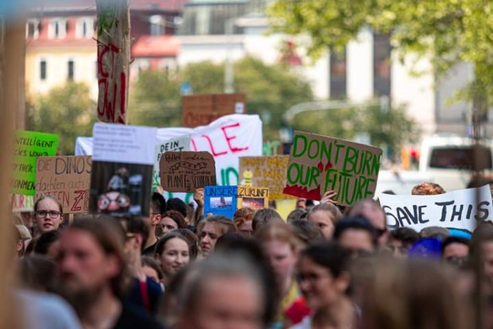 Protestor with ‘papulation receptionists’ banner arrested by the Anagram Police