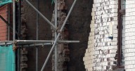 Major road closed after sudden building collapse as emergency services called to scene