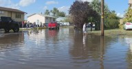Residents come together to help clean up after damaging floods in Salt Lake