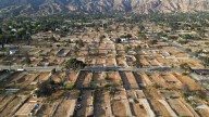 Should plants be allowed right next to your home? California may soon say no