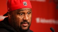 Bucs assistant Skip Peete collapses at practice but is alert, stable