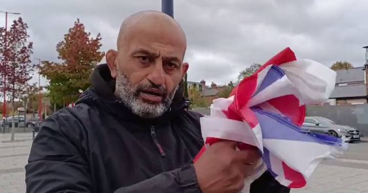 Ex-soldier takes down flags and gives them to charity shops