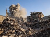 Israel attacks Hamas posts, suspends aid as ceasefire frays