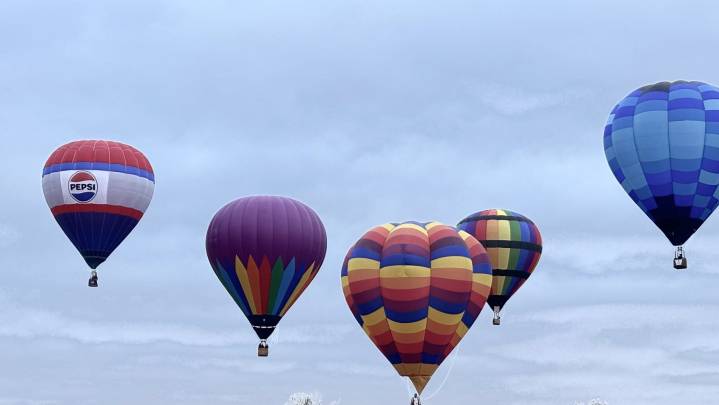 Hot air balloons fill the sky at Palo Duro Canyon State Park