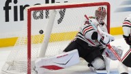 Panthers fans cheer for former goalie Spencer Knight in season opener