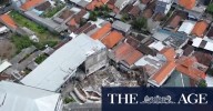 More than 90 students remain trapped in ruins of collapsed school building