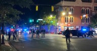 Gunmen kill two, injure 12 in a shootout in a crowd in Alabama capital city's downtown