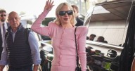 Lady Gaga Elevates Travel Chic With Towering Pink Platforms in Photos