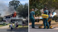 Resident rushed to hospital with multiple burns as house engulfed in flames in Woodridge