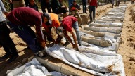 Palestinians hold mass funeral for 54 unidentified prisoners