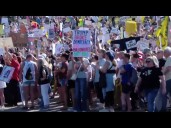 Massive crowds take to streets to protest Trump administration