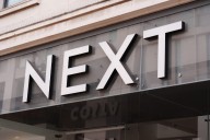 Next expected to reveal sales momentum despite consumer pressure
