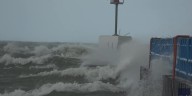 Large waves batter Lake Michigan pier as 50 mph winds roar ashore