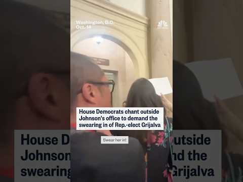 House Democrats chant outside Johnson's office to demand the swearing in of Rep.