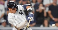 Judge rallies Yankees past Blue Jays 9-6 to save season, avert ALDS sweep