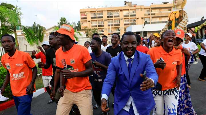 Supporters celebrate Ivory Coast president’s massive election victory