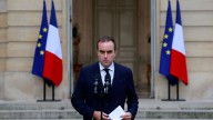 In shock move, French president reappoints prime minister who quit Monday