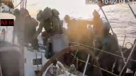 Israeli navy intercepts some flotilla boats but others are nearing the coast of Gaza, activists say