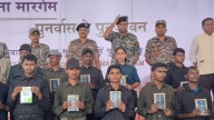 Roses, the Constitution, and posing for cameras: As 210 Naxals lay down arms in Abujhmad, why it’s a big deal