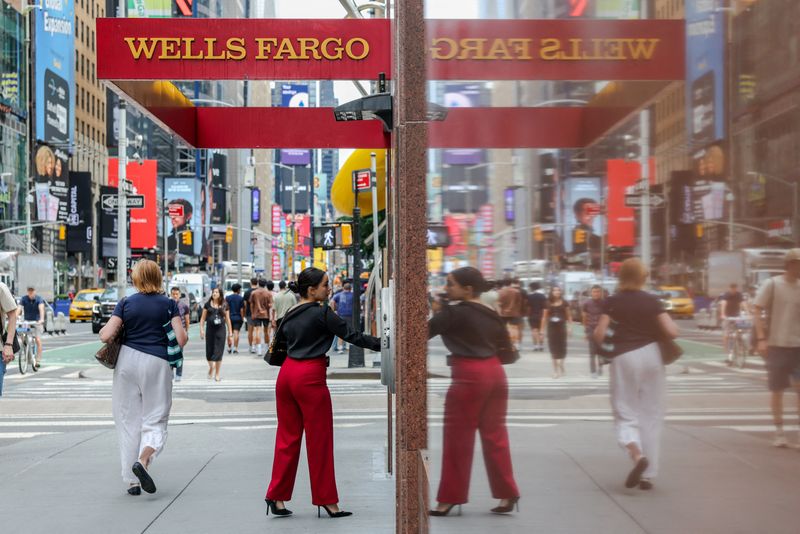 Wells Fargo tops profit estimates, raises return target after asset cap lifted