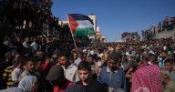 Israel plans to halve aid into Gaza over slow return of dead hostages, a test for the Gaza ceasefire